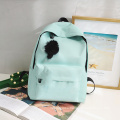 Fashion polyester customize Logo trend high school bag simple color travel backpacks pendant bags